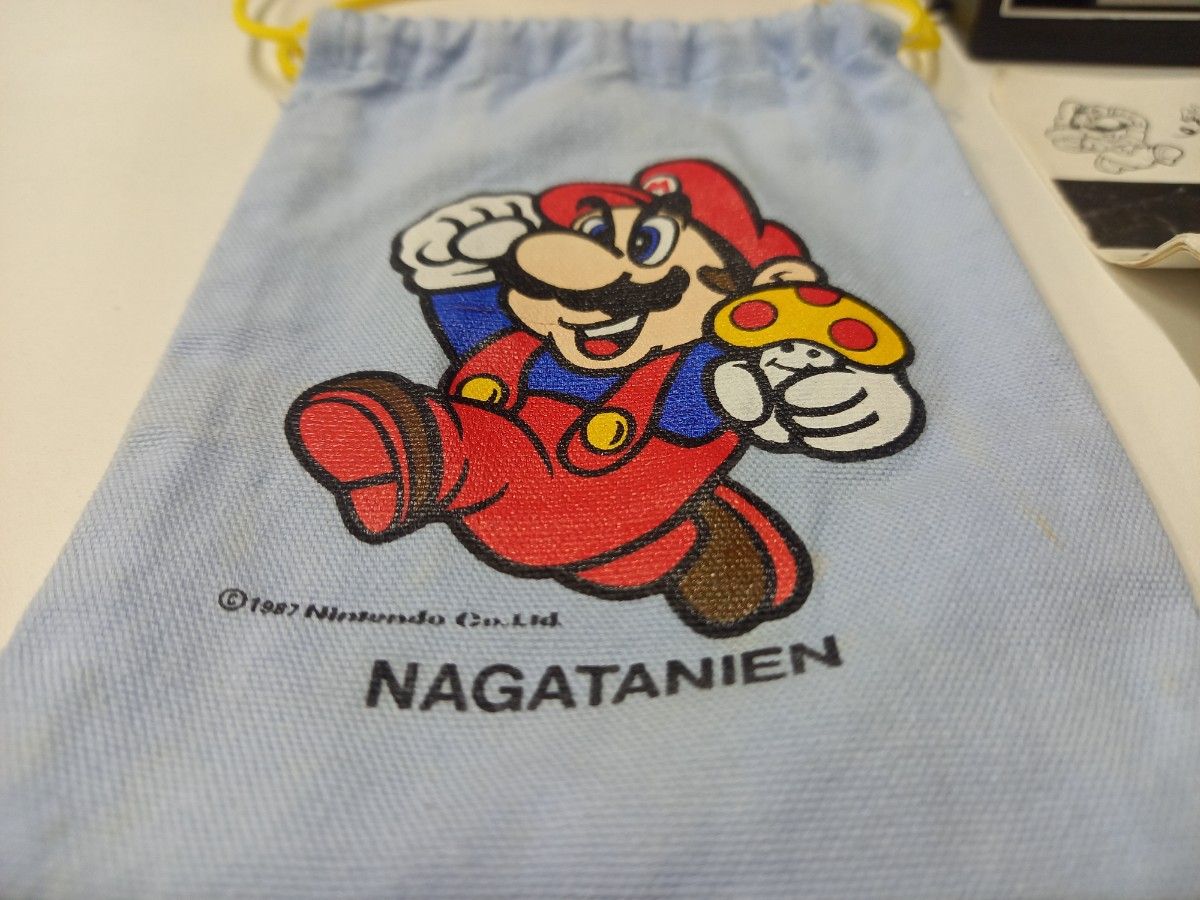 奇跡の一品シリーズ②】新品未使用 スーパーマリオ カメラ 巾着 説明書