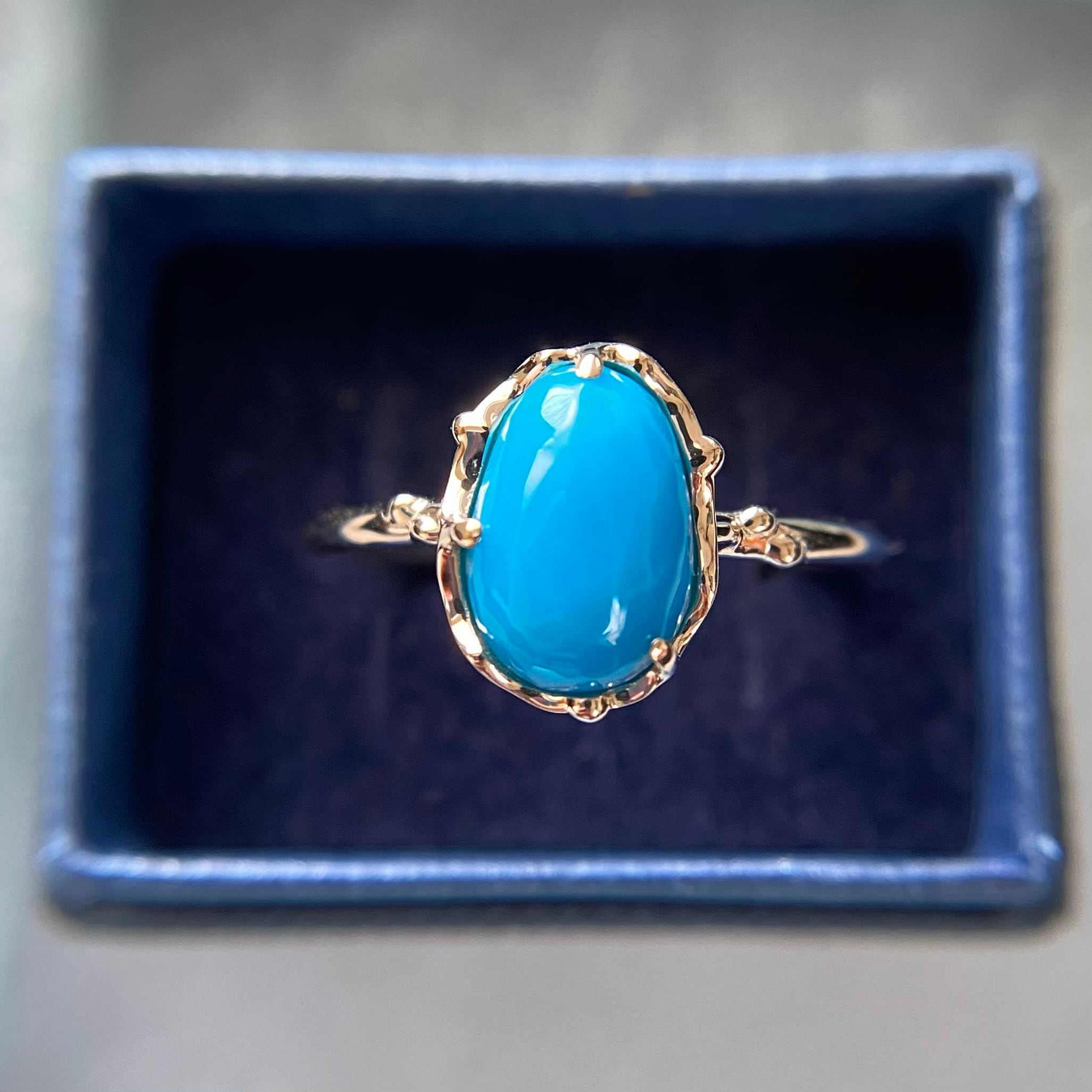 K10 天然トルコ石リング スリーピングビューティー産原石から磨いた1点