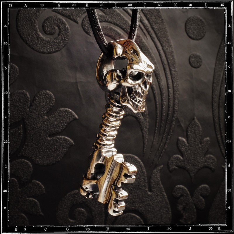 Skull key pendant