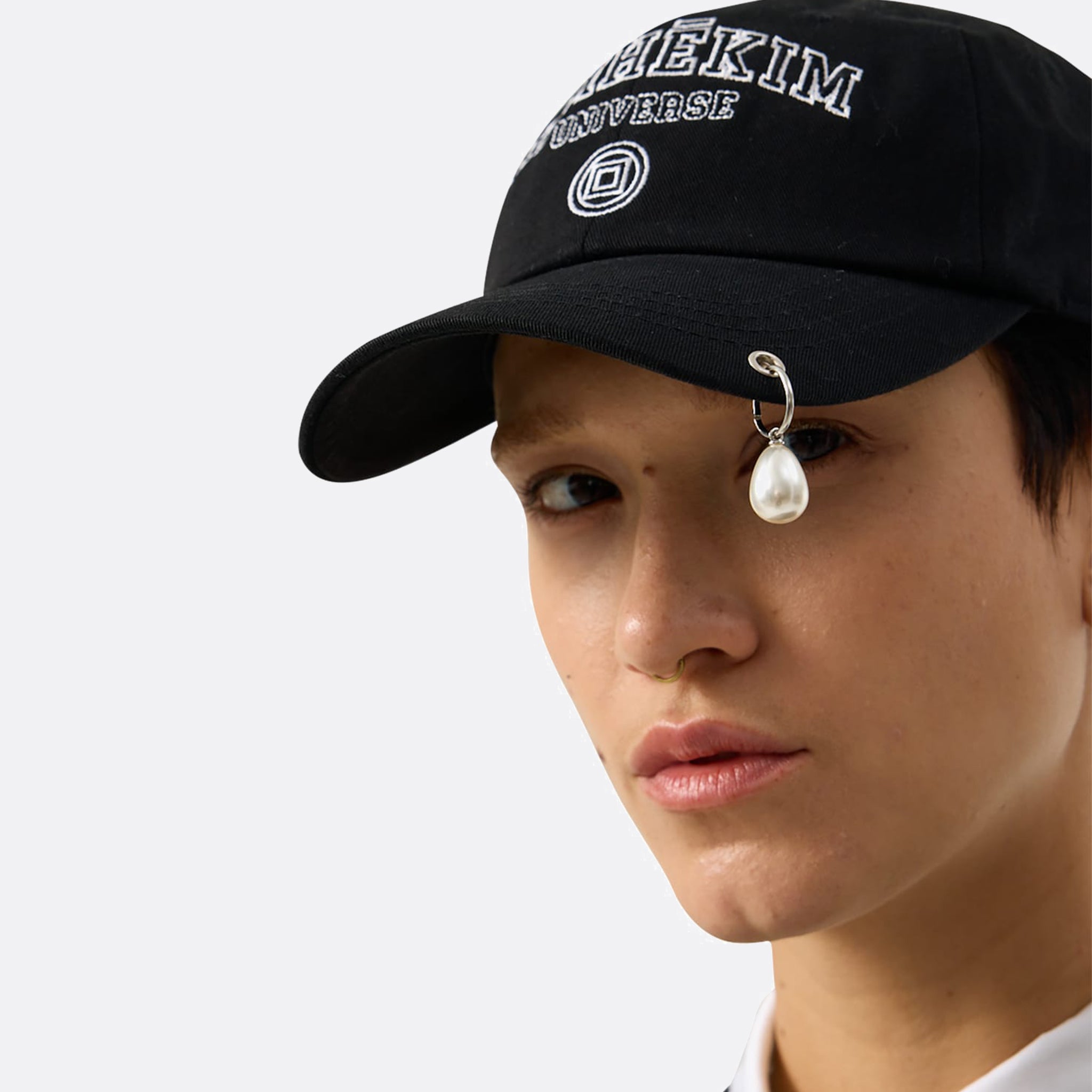 KIMHĒKIM Pearl Pierced Baseball Cap – Black | Sculptural