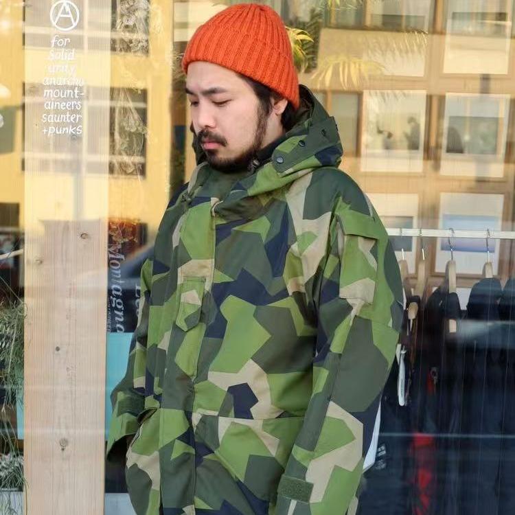 幾何学迷彩フードジャケット ミリタリージャケット メンズ|ミリタリー