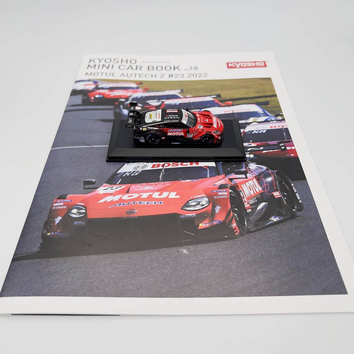 Kyosho 1:64 Motul Autech Z #23 2022 - Mini Car & Book Special