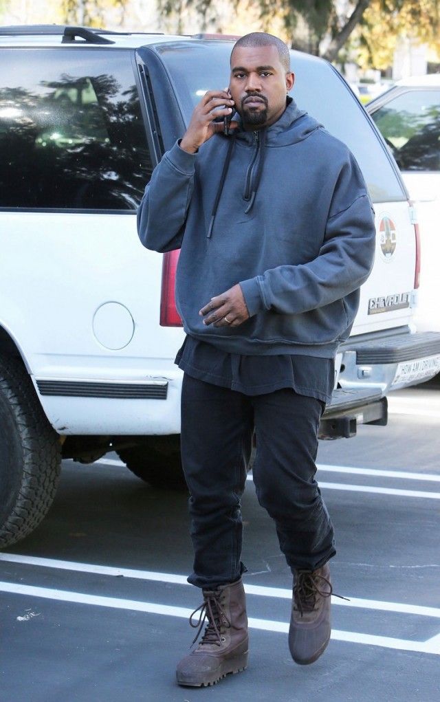 Kanye West Wears Yeezy Season Hoodie, Boots, Fear of God Tee and
