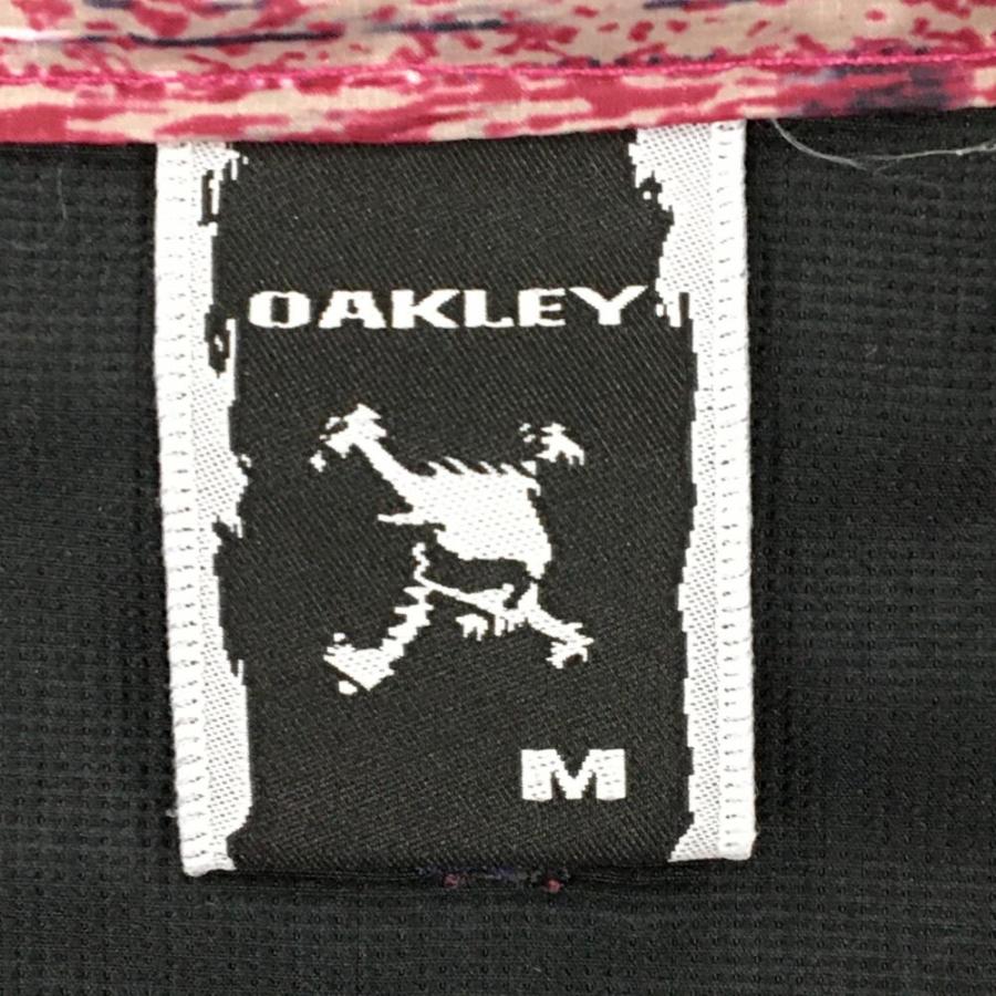 美品】オークリー ダウンベスト ボルドー×ベージュ 総柄 スカル