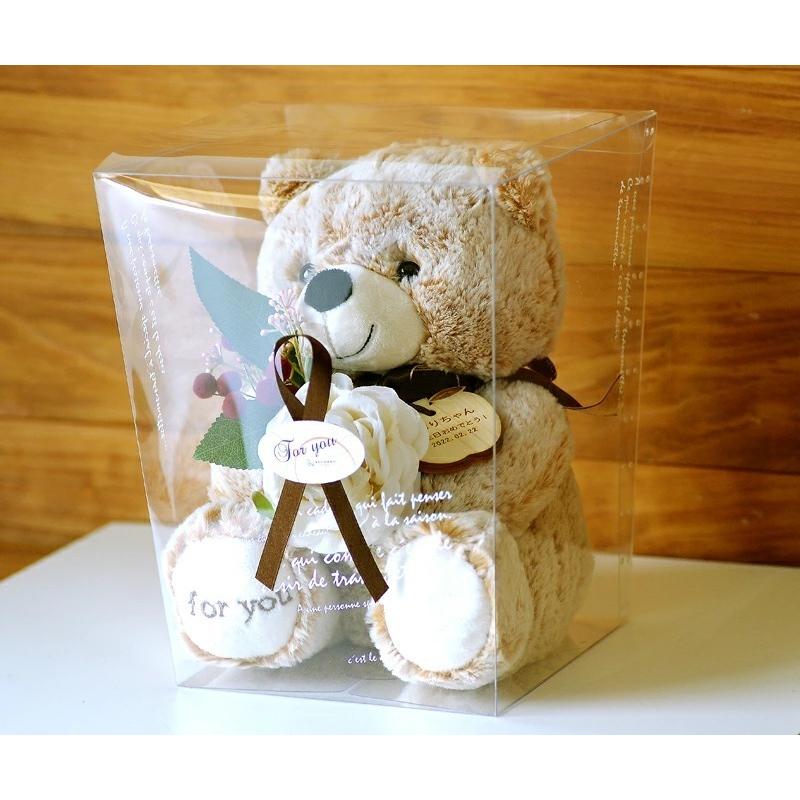 □☆メッセージとお花を抱えた くまちゃん リンゴキーホルダーに自由