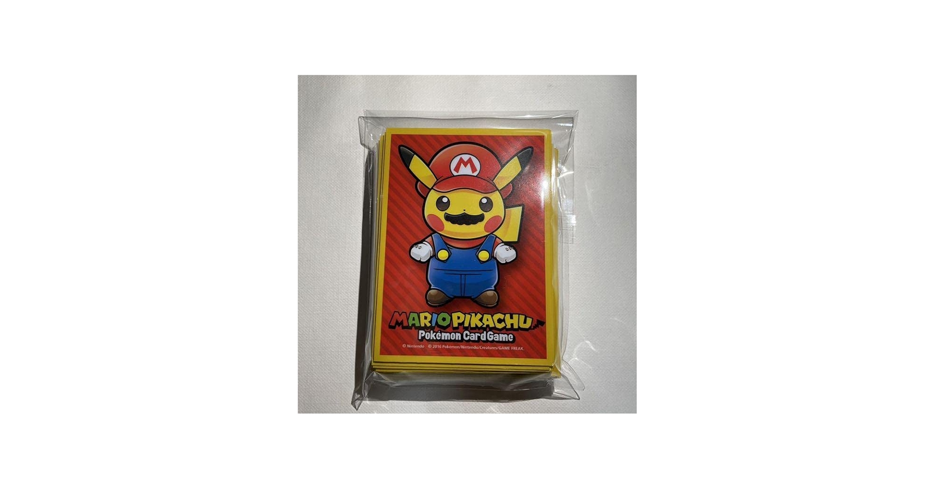 Amazon.co.jp: マリオピカチュウ スリーブ64枚 : ホビー