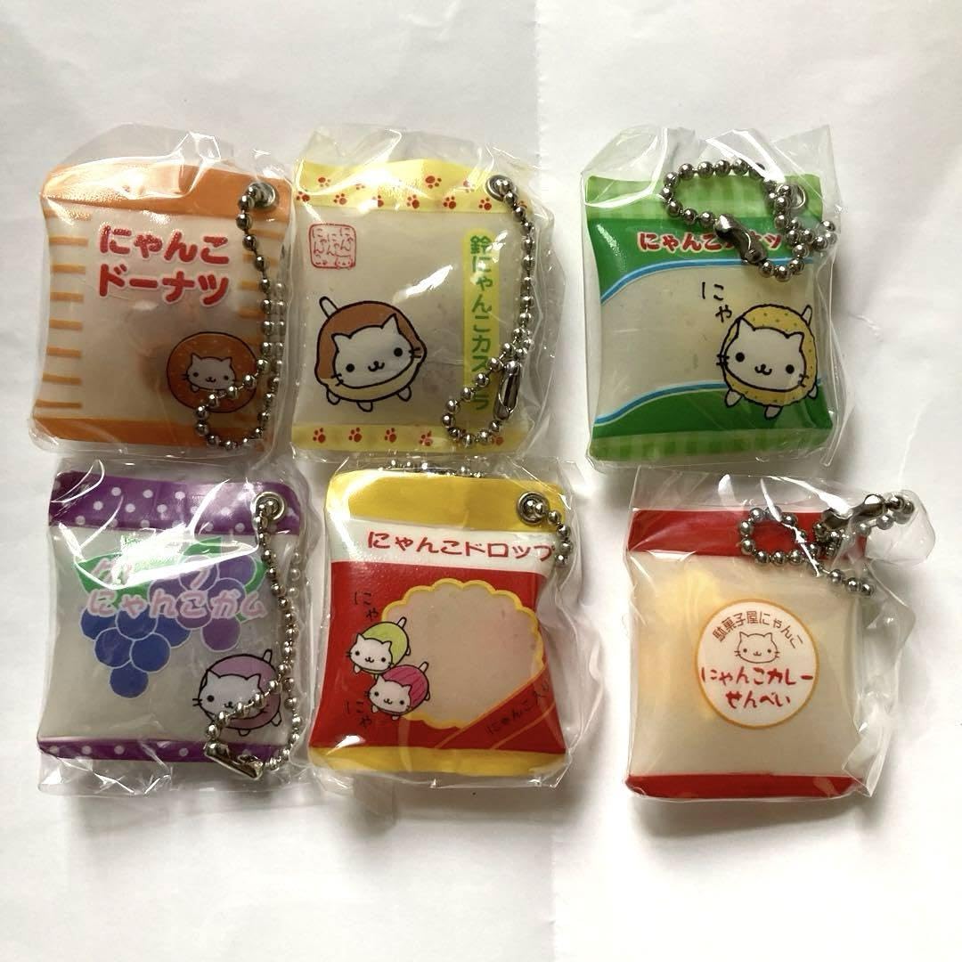 Amazon.co.jp: 激!にゃんにゃんにゃんこ シャカシャカスイング 駄菓子