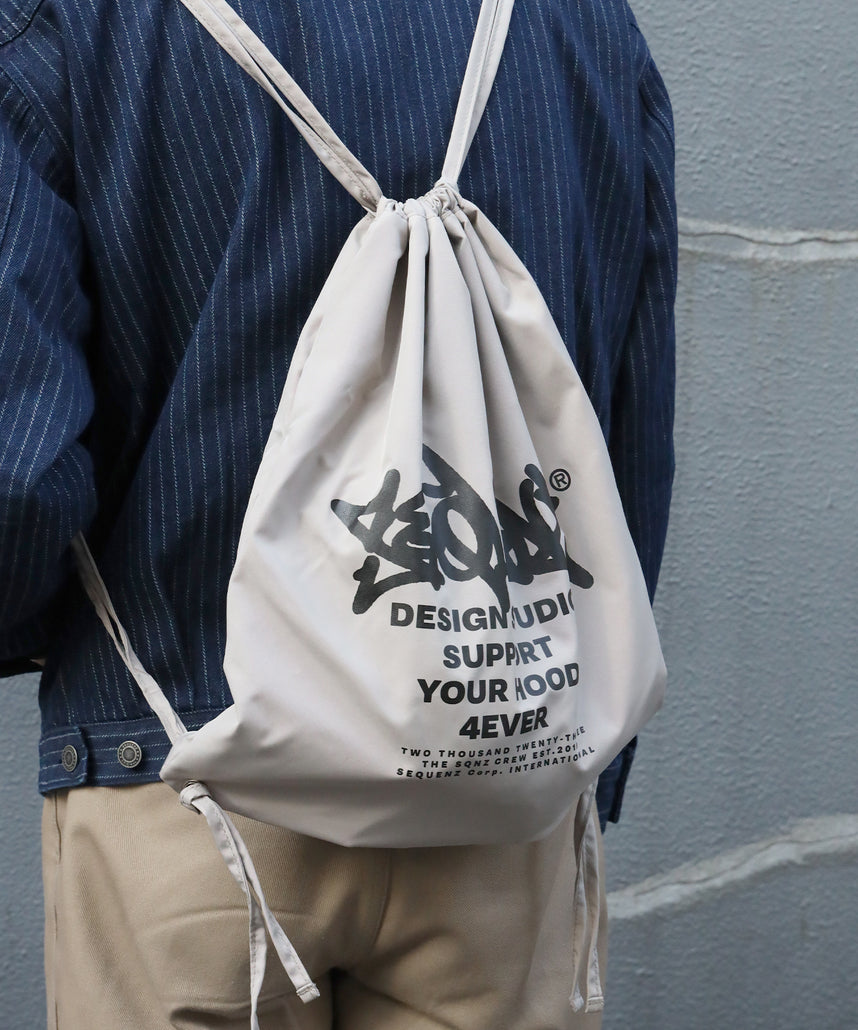 SEQUENZ 2 FACE STRING KNAPSACK / リバーシブル テック ナップサック