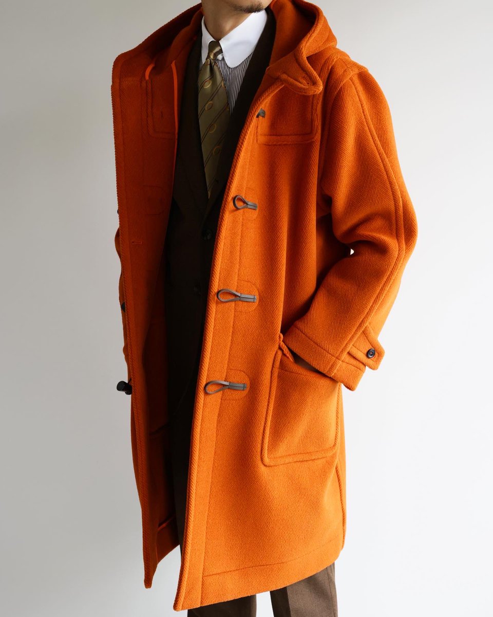 オレンジ色のダッフルコートは大人の憧れの一着ではなかろうか