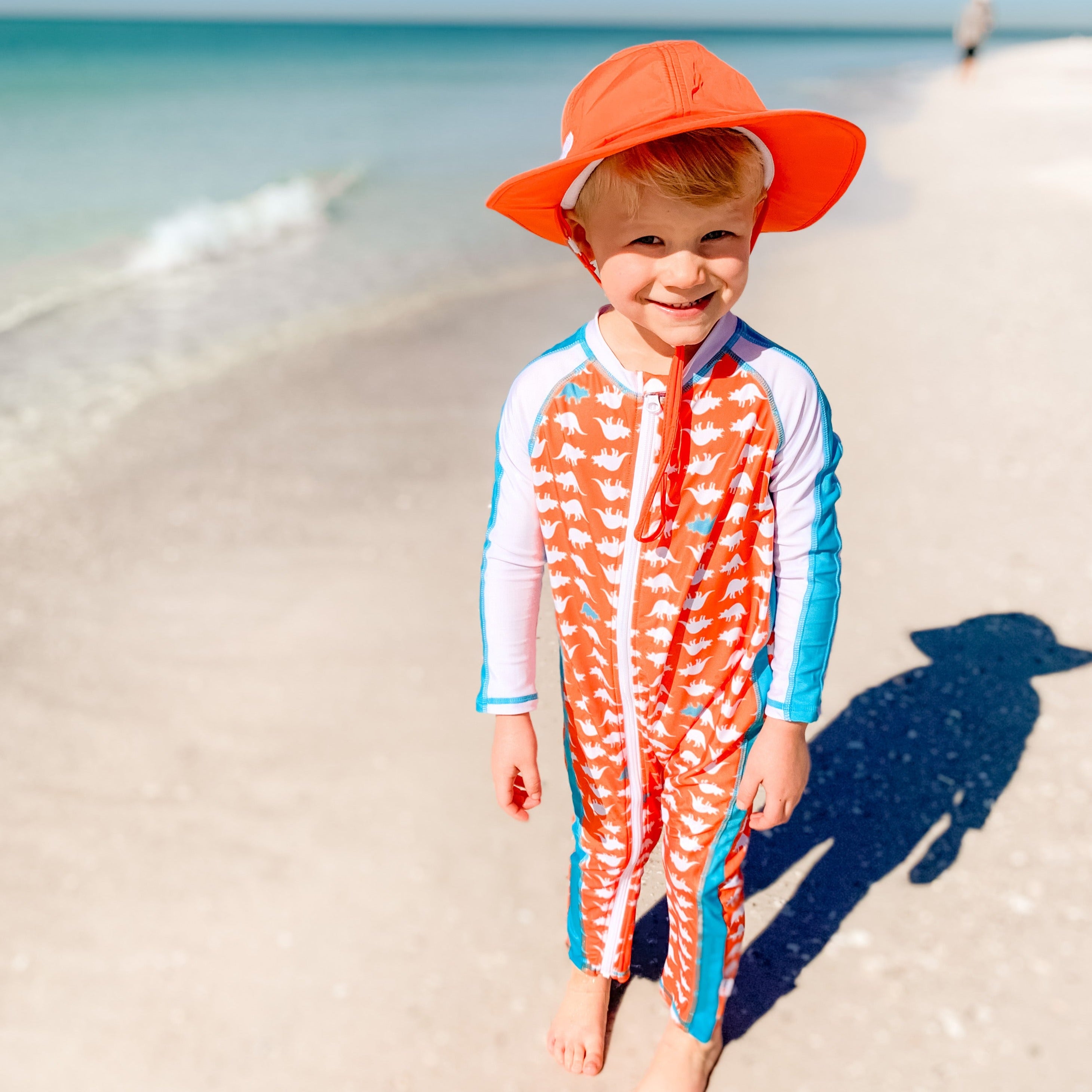SwimZip Boy's Long Sleeve Sunsuit One-Piece Romper - Dino Mite Orange