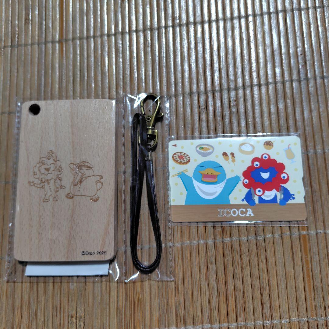 ミャクミャクとのコラボ木製パスケース - メルカリ