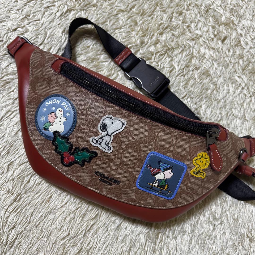 コーチ　ウエストポーチ　スヌーピー　コラボ　シグネチャー　斜め掛け　ボディバッグ COACH（コーチ） ボディバッグ 【COACH X PEANUTS コラボ】 サリバン
