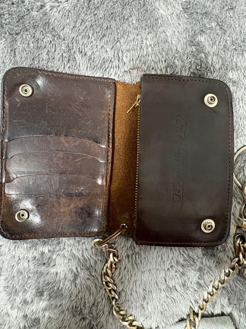 HTC ミドルウォレット ターコイズ フラワーモチーフ スタッズダーク