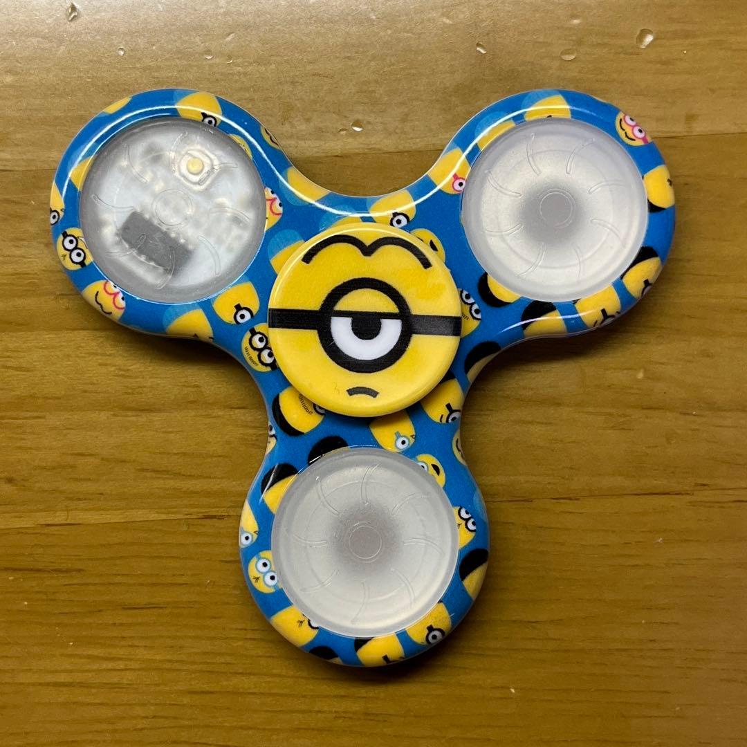 ミニオン シャイニングハンドスピナー - メルカリ