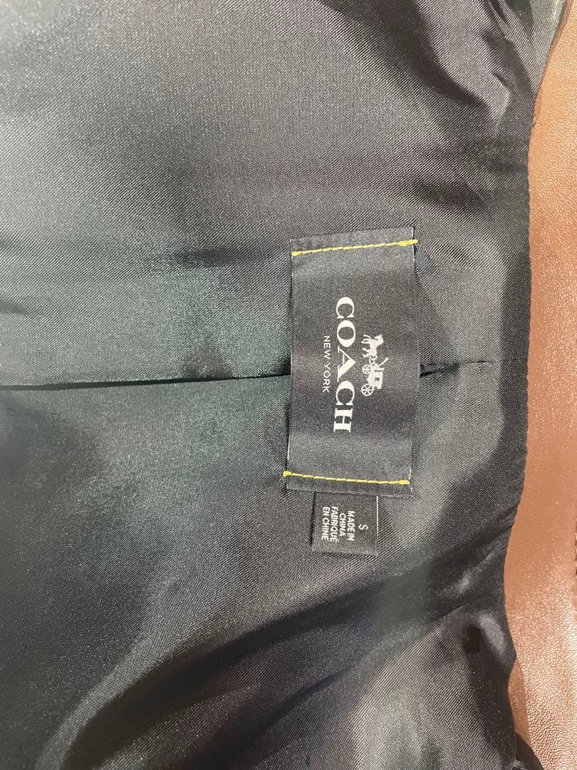 引越前処分価格> COACH ブラウン レザー シングルライダース S - メルカリ