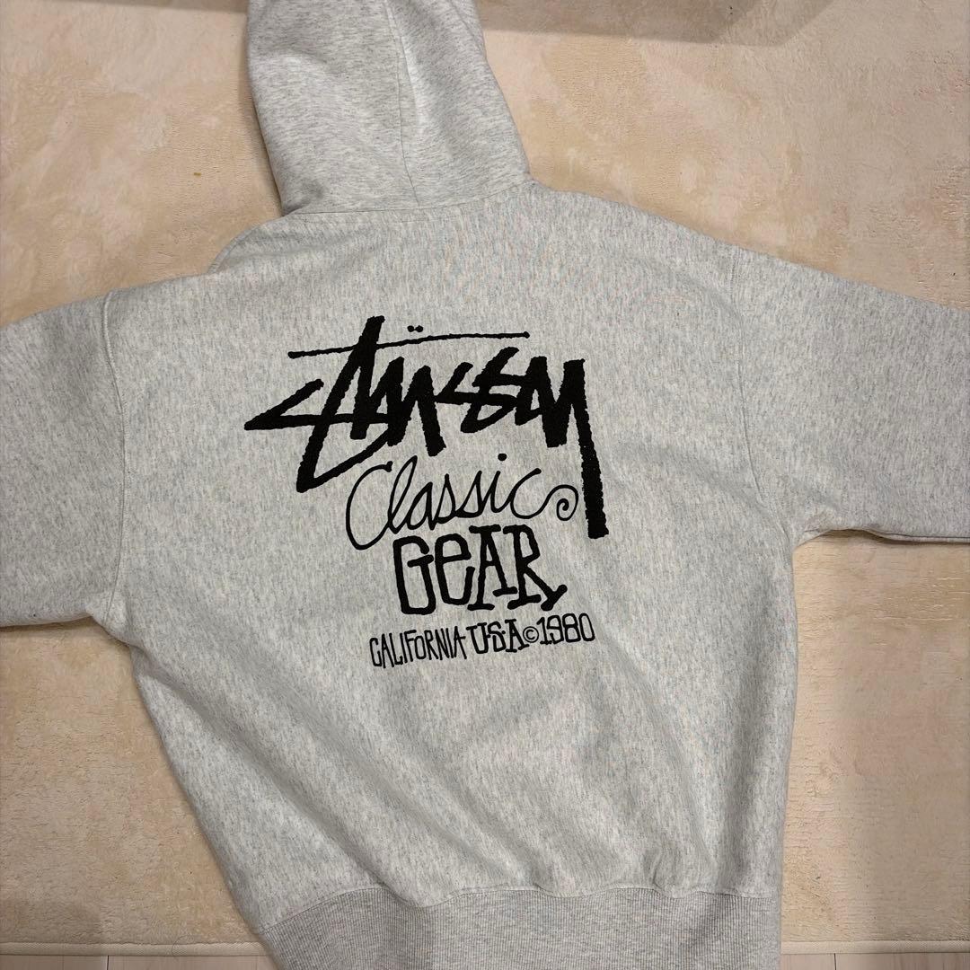 Stüssy グレー パーカー Mサイズ - メルカリ