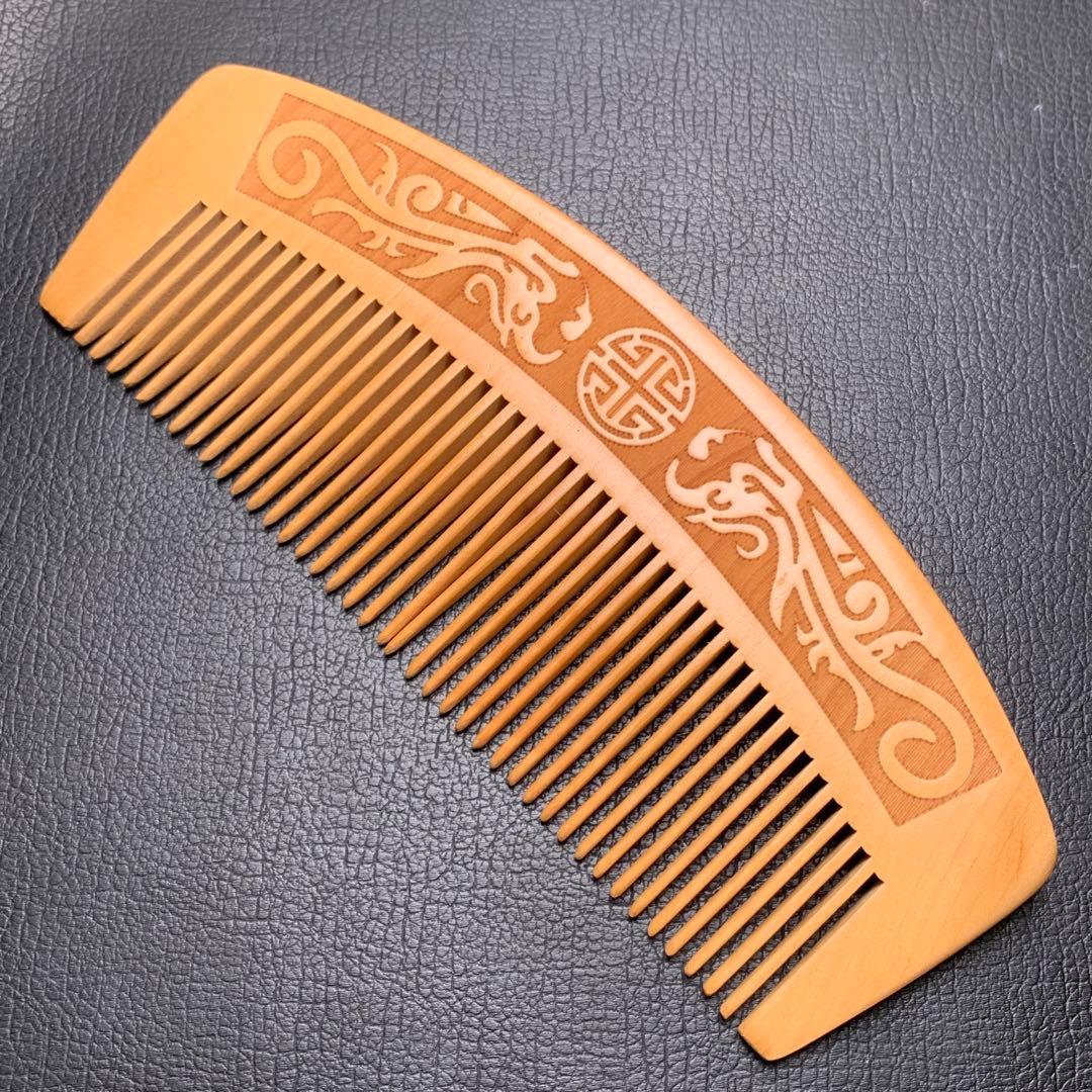 0422163  桃の木素材櫛57.6＊144.4ミリ