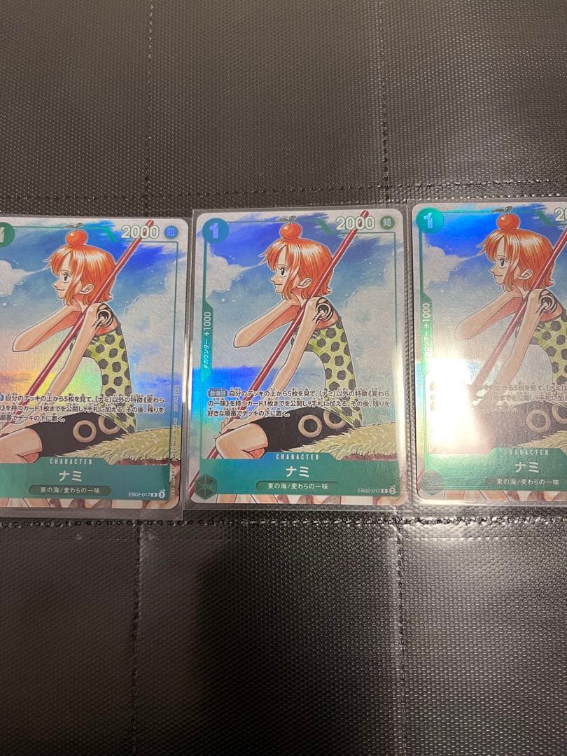 ワンピースカードゲーム 3周年記念ガイドブック ＋ナミ3枚 - メルカリ