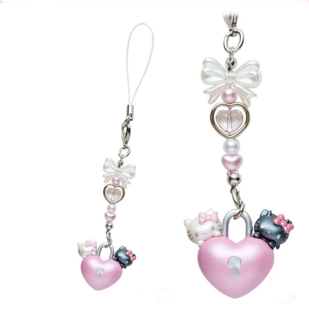 サンリオ ハローキティ シークレットストラップ（天使小悪魔デザイン