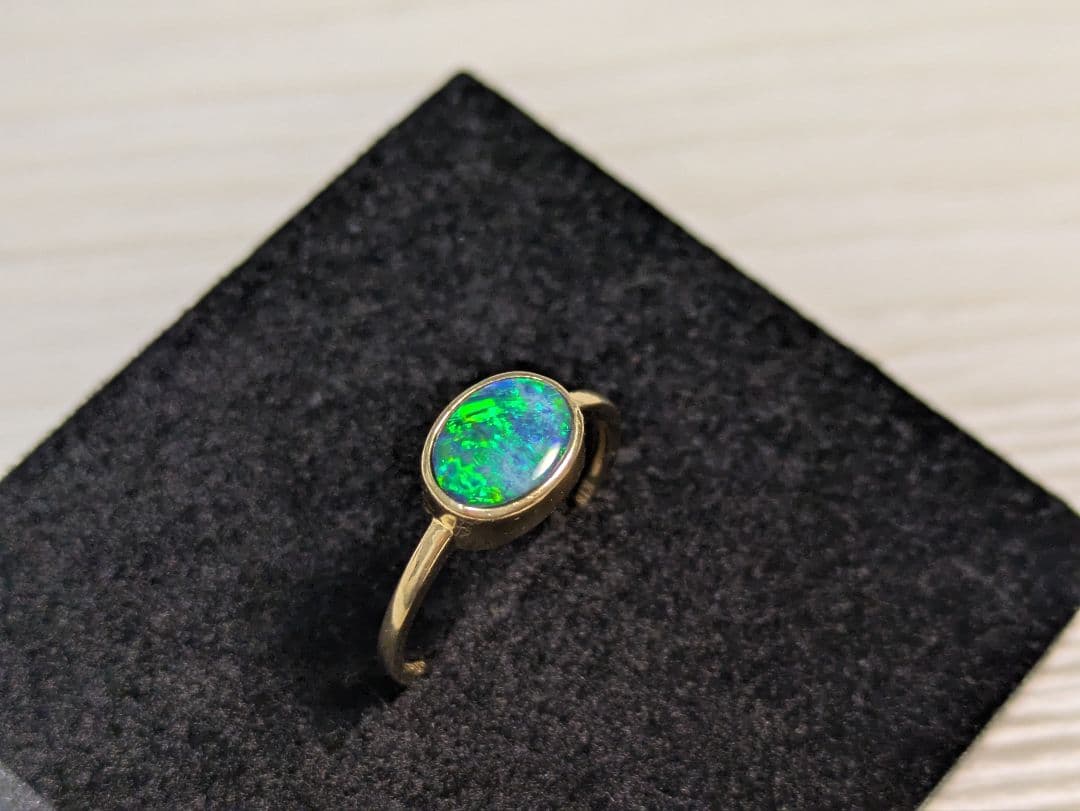 K18 0.77ct 12号 ボルダーオパールリング