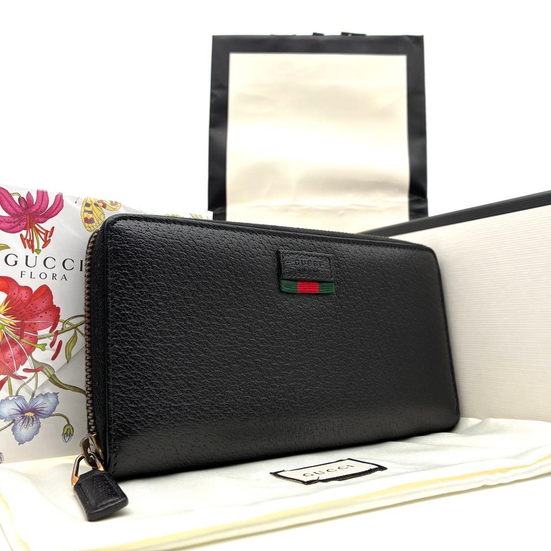 未使用に近い グッチ 長財布 シェリーライン ロゴ レザー ラウンドジップ 黒