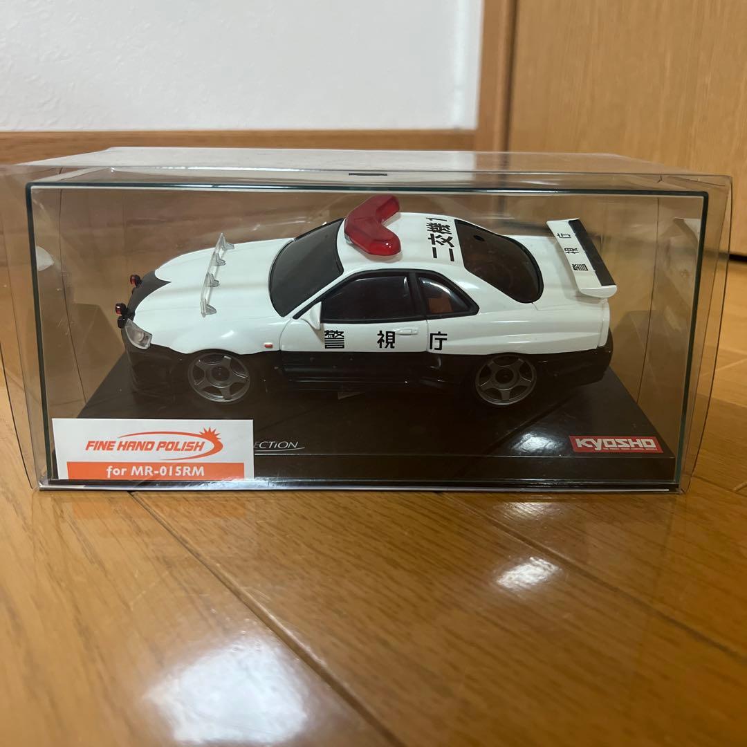ミニッツ 警視庁パトカー R34 GTR R34スカイラインGT-Rのパトカーが 装備をリニューアルしミニカーで登場
