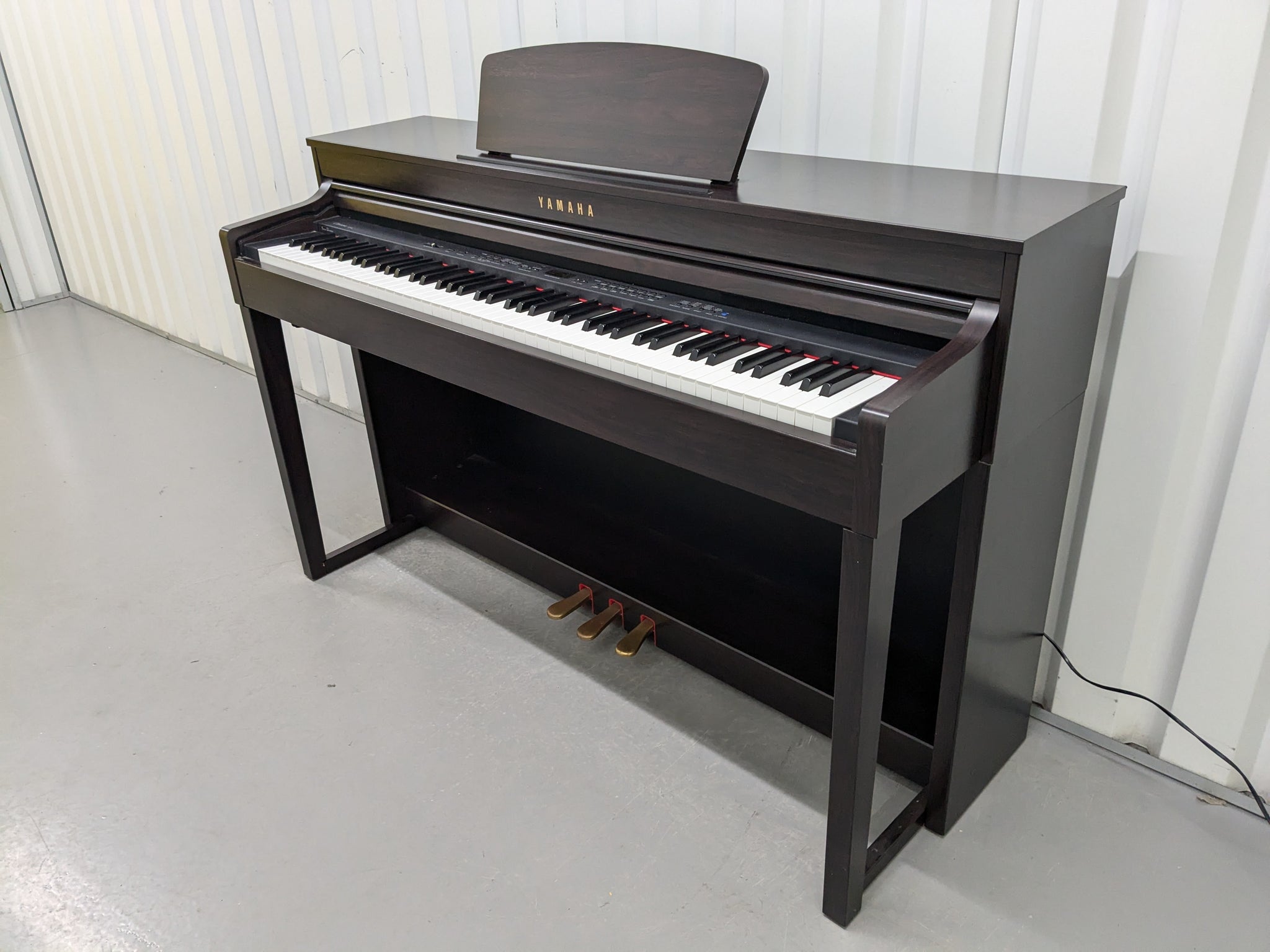 Yamaha Clavinova CLP-430 digital piano in dark rosewood stock