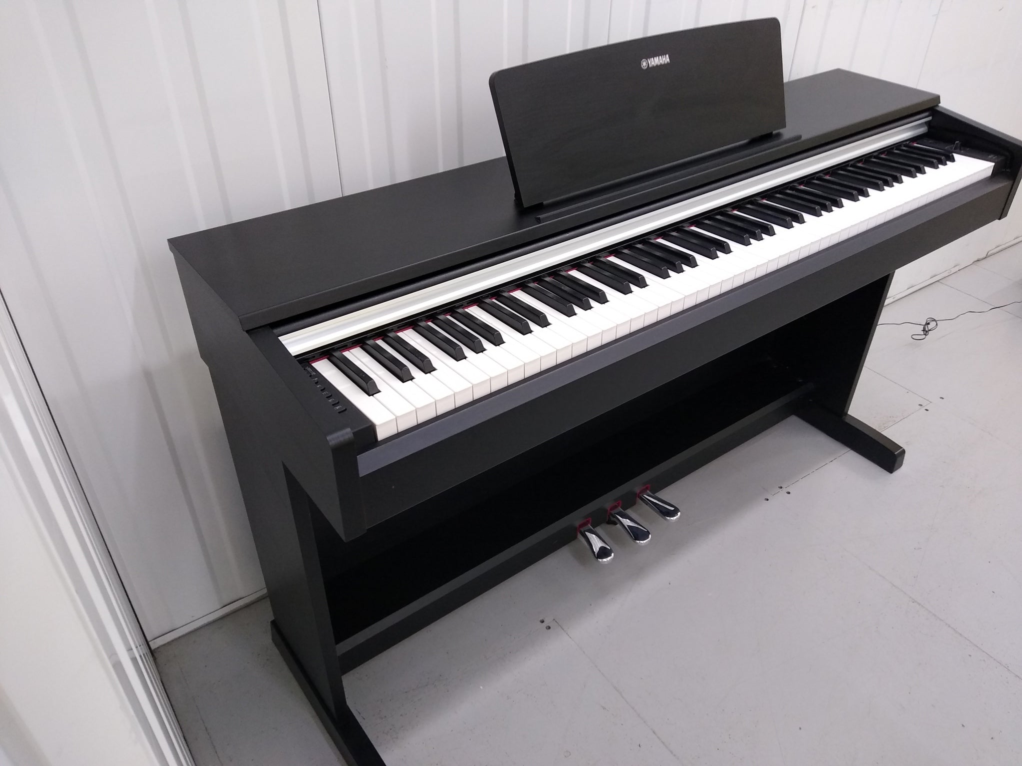 Yamaha Arius YDP-142B Digital Piano in black weighted keys stock